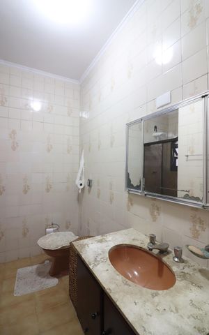 Casa à venda com 168m², 4 quartos e 2 vagasQuarto 1 - Suíte Banheiro 