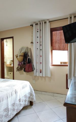 Casa de condomínio à venda com 300m², 3 quartos e 2 vagas Casa de condomínio à venda com 300m², 3 quartos e 2 vagasQuarto 3 - Suíte