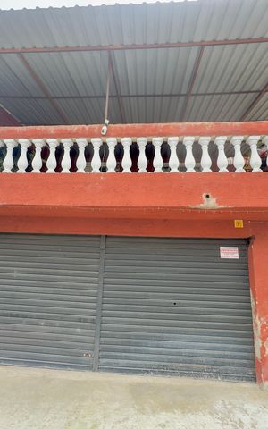 Casa à venda com 70m², 3 quartos e 1 vagaPlaca instalada na fachada do imóvel