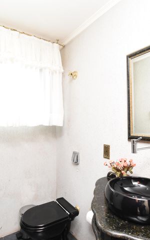 Casa à venda com 440m², 4 quartos e 3 vagasLavabo