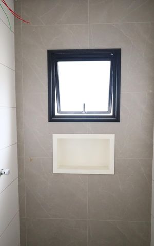 Casa à venda com 125m², 3 quartos e sem vagaBanheiro da Suíte 2