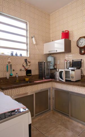 Casa à venda com 150m², 3 quartos e 4 vagas Casa à venda com 150m², 3 quartos e 4 vagasCozinha