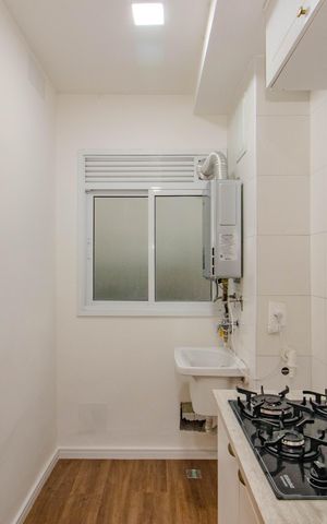 Apartamento à venda com 63m², 3 quartos e 1 vaga Apartamento à venda com 63m², 3 quartos e 1 vagaCozinha e Área de Serviço