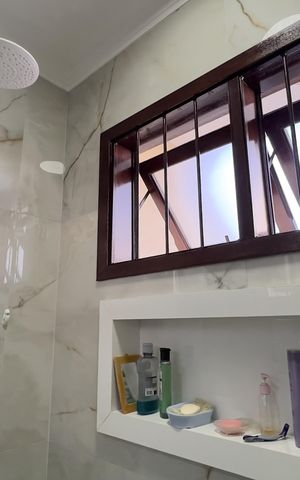 Casa à venda com 240m², 3 quartos e 4 vagas Casa à venda com 240m², 3 quartos e 4 vagasBanheiro da Suíte 1