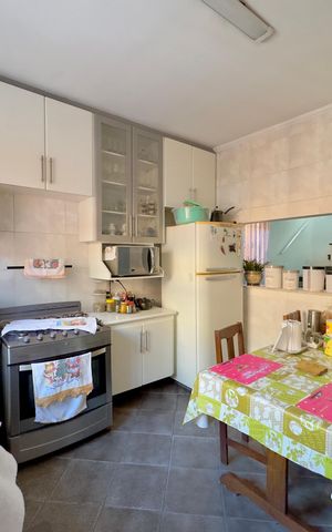 Casa à venda com 125m², 3 quartos e 2 vagas Casa à venda com 125m², 3 quartos e 2 vagasCozinha