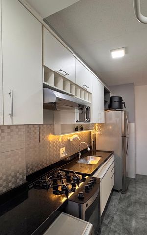 Apartamento à venda com 50m², 2 quartos e 1 vaga Apartamento à venda com 50m², 2 quartos e 1 vagaCozinha e Área de Serviço