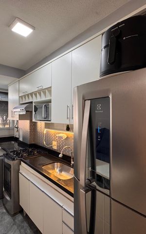 Apartamento à venda com 50m², 2 quartos e 1 vaga Apartamento à venda com 50m², 2 quartos e 1 vagaCozinha e Área de Serviço