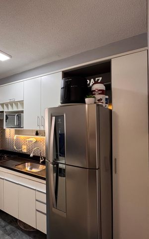 Apartamento à venda com 50m², 2 quartos e 1 vaga Apartamento à venda com 50m², 2 quartos e 1 vagaCozinha e Área de Serviço