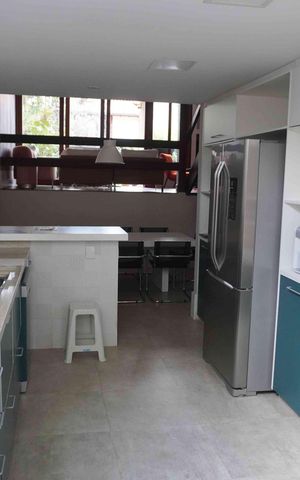 Casa de condomínio à venda com 180m², 3 quartos e 2 vagasCozinha e Área de Serviço