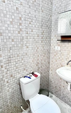 Casa de condomínio para alugar com 64m², 2 quartos e 1 vaga Casa de condomínio para alugar com 64m², 2 quartos e 1 vagaBanheiro da Suíte 1