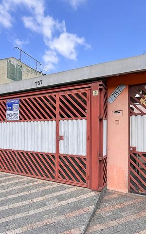Casa à venda com 162m², 5 quartos e 2 vagasFachada + plaquinha 