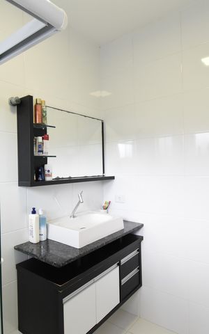 Casa de condomínio para alugar com 130m², 3 quartos e 2 vagasBanheiro da Suíte
