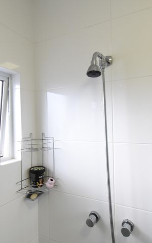Casa de condomínio para alugar com 130m², 3 quartos e 2 vagasBanheiro da Suíte
