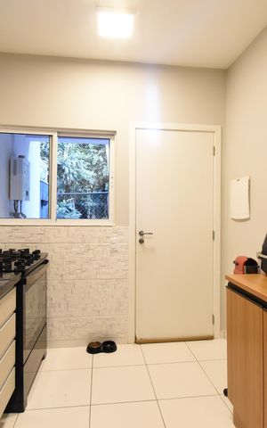 Casa de condomínio para alugar com 130m², 3 quartos e 2 vagasCozinha