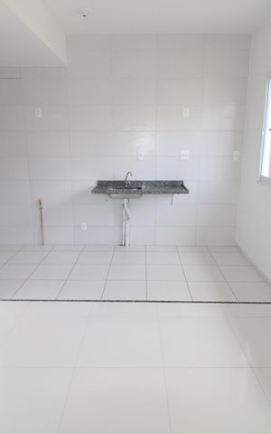 Casa de condomínio para alugar com 57m², 2 quartos e 1 vagaSala / Cozinha