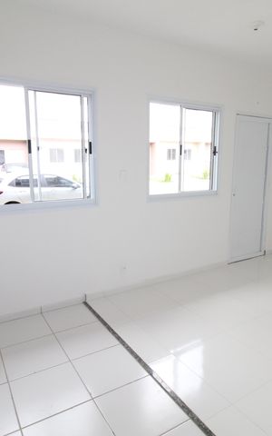 Casa de condomínio para alugar com 57m², 2 quartos e 1 vagaSala / Cozinha