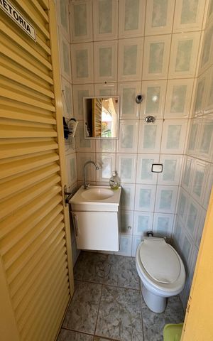 Casa à venda com 390m², 6 quartos e 7 vagas Casa à venda com 390m², 6 quartos e 7 vagasLavabo 3 Anexo 2