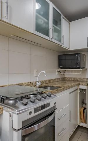 Apartamento à venda com 55m², 2 quartos e 2 vagasCozinha e Área de Serviço