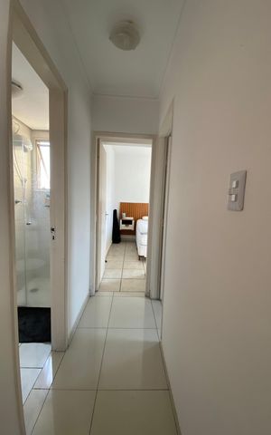 Apartamento à venda com 52m², 2 quartos e 1 vaga Apartamento à venda com 52m², 2 quartos e 1 vagaCorredor acesso aos quartos