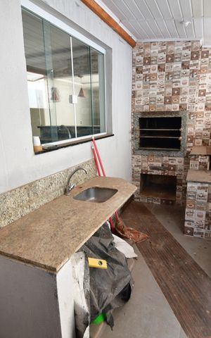 Casa à venda com 200m², 4 quartos e 2 vagasChurrasqueira