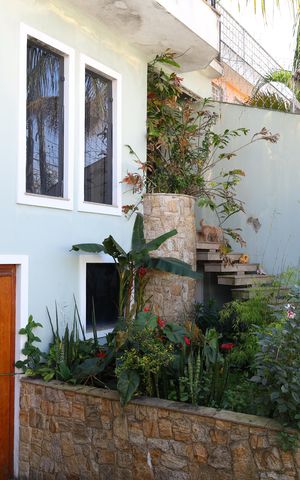 Casa para alugar com 420m², 4 quartos e 5 vagasJardim frontal