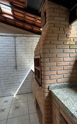 Casa de condomínio à venda com 128m², 2 quartos e 2 vagasChurrasqueira