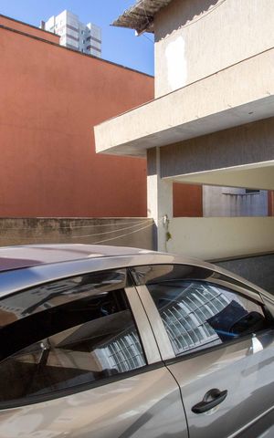 Casa para alugar com 372m², 7 quartos e 4 vagasGaragem Casa 1