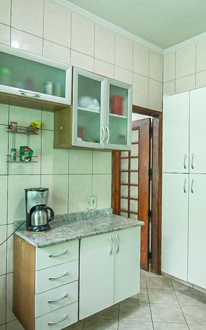Casa para alugar com 100m², 3 quartos e 2 vagasCozinha