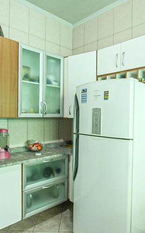 Casa para alugar com 100m², 3 quartos e 2 vagasCozinha