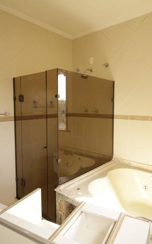 Casa de condomínio para alugar com 700m², 3 quartos e 2 vagasBanheiro da Suíte 3