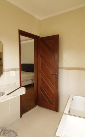 Casa de condomínio para alugar com 700m², 3 quartos e 2 vagasBanheiro da Suíte 3