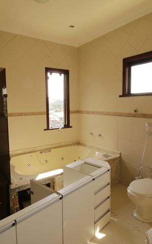 Casa de condomínio para alugar com 700m², 3 quartos e 2 vagasBanheiro da Suíte 3