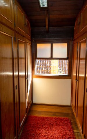 Casa de condomínio à venda com 400m², 4 quartos e 6 vagasCloset 1 da Suíte 
