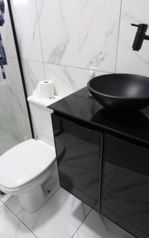 Casa à venda com 150m², 4 quartos e 4 vagasBanheiro da Suíte 2