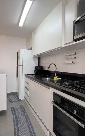 Apartamento à venda com 65m², 2 quartos e 1 vaga Apartamento à venda com 65m², 2 quartos e 1 vagaCozinha e área de serviço