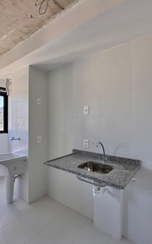 Apartamento à venda com 60m², 3 quartos e 1 vaga Apartamento à venda com 60m², 3 quartos e 1 vagaCozinha e Área de Serviço