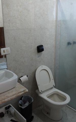 Casa de condomínio à venda com 404m², 3 quartos e 6 vagasBanheiro da Suíte 2