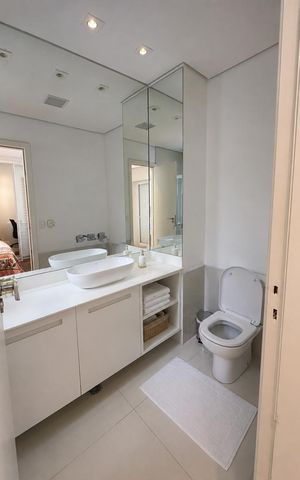 Casa de condomínio para alugar com 250m², 4 quartos e 3 vagas Casa de condomínio para alugar com 250m², 4 quartos e 3 vagasBanheiro da Suíte 1