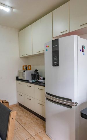 Casa à venda com 116m², 3 quartos e 3 vagas Casa à venda com 116m², 3 quartos e 3 vagasCozinha
