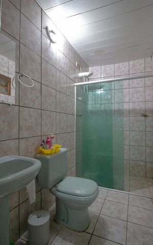 Casa à venda com 233m², 3 quartos e 6 vagasBanheiro da suíte