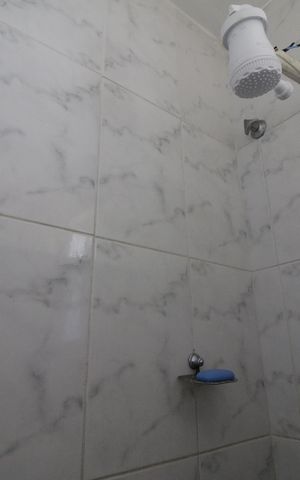 Casa de condomínio à venda com 88m², 2 quartos e 2 vagasBanheiro da Suíte 1