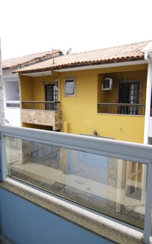 Casa de condomínio à venda com 88m², 2 quartos e 2 vagasVaranda da Suíte 1