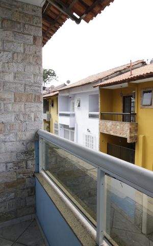 Casa de condomínio à venda com 88m², 2 quartos e 2 vagasVaranda da Suíte 1