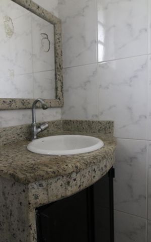 Casa de condomínio à venda com 88m², 2 quartos e 2 vagasBanheiro da Suíte 1