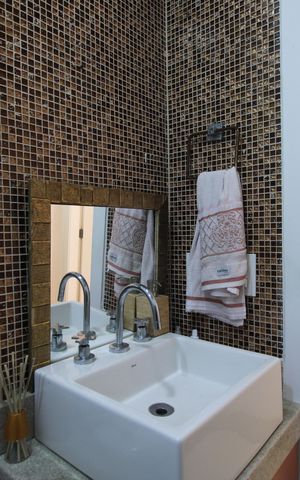 Casa de condomínio à venda com 250m², 3 quartos e 1 vagaBanheiro social