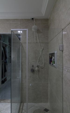 Casa de condomínio à venda com 310m², 5 quartos e 3 vagasBanheiro da Suíte