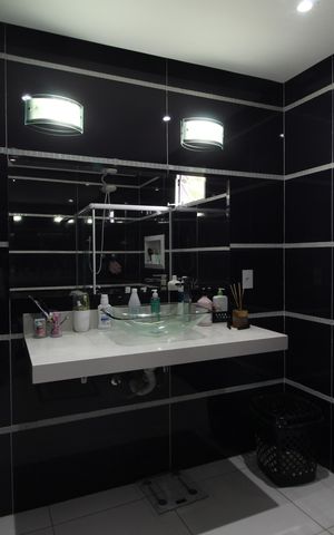 Casa de condomínio à venda com 310m², 5 quartos e 3 vagasBanheiro Social 1