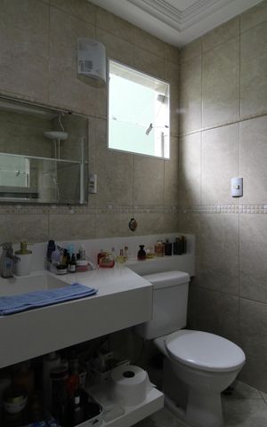 Casa de condomínio à venda com 310m², 5 quartos e 3 vagasBanheiro da Suíte