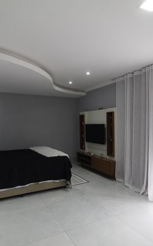 Casa de condomínio à venda com 310m², 5 quartos e 3 vagasSuíte