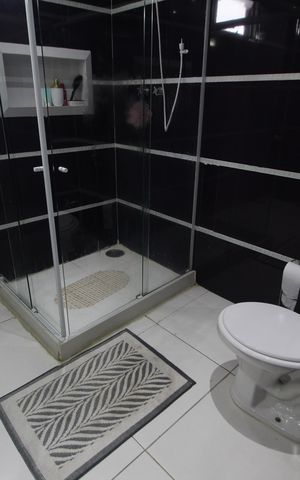 Casa de condomínio à venda com 310m², 5 quartos e 3 vagasBanheiro Social 1